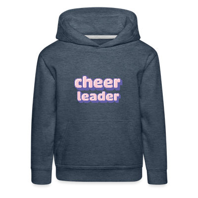 Kinder Hoodie mit Kapuze und Kangaroopocket. Der Aufdurck ist: Cheerleader in lila,weiß, rosa Pixelschrif. Der Pullover ist heather denim.
