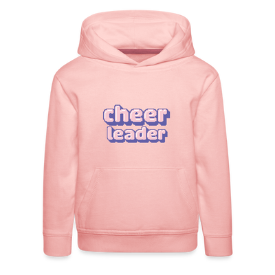 Kinder Hoodie mit Kapuze und Kangaroopocket.  Der Aufdurck ist: Cheerleader in lila,weiß, rosa Pixelschrif. Der Pullover ist rosa.