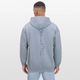 Ein mänlich gelesene Person trägt hier einen Hoodie mit dem Motiv: One Line Partnerstunt Scorpion in hellem blau. Die Person trägt eine Jeanshose und hat dunkle, kurze Haare. Sie steht vor einer weißen Wand.