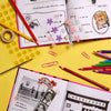 Two Books of: CHEERLEADING FRIENDSHIP BOOK: for Juniors & Seniors are laying on yellow background surrounded by pencils ans stickers.